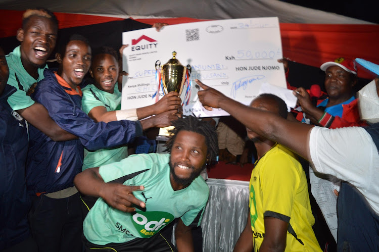 Superoot Kiamumbi football team celebrates after becoming the champions of Kiambu football league