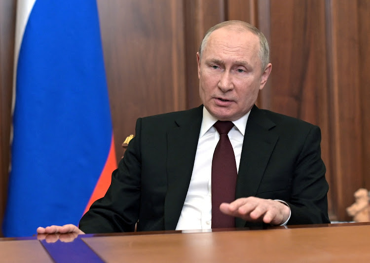 Russian President Vladimir Putin delivers a video address to the nation, in Moscow, Russia, February 21 2022. Picture: SPUTNIK/REUTERS