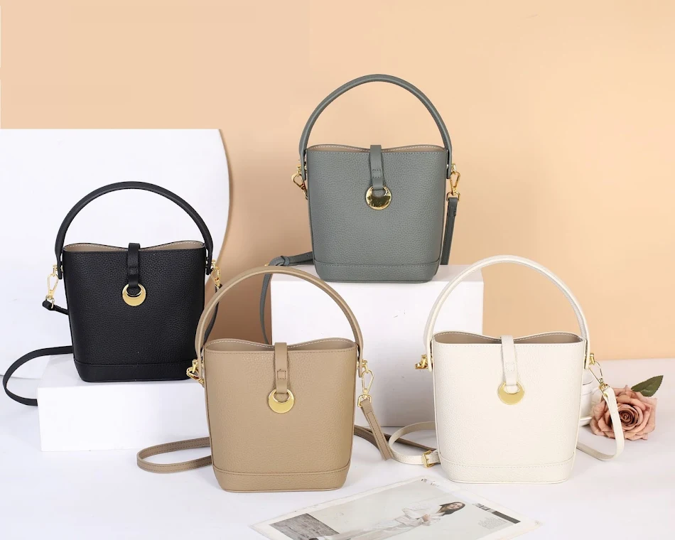 Eerstelaags rundleer dames schoudertas, hoogwaardig en elegant, ideaal voor dagelijks gebruik. Duurzame en stijlvolle schoudertas.