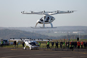 A Volocopter 2X drone taxi performs an integrated flight in conventional air traffic at Pontoise airfield in Cormeilles-en-Vexin, near Paris, France, November 10, 2022. 