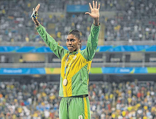 TRIUMPHANT: Caster Semenya of South Africa celebrating her gold medal in the women’s 800m race on Saturday at the Olympic Stadium in Rio de Janeiro, Brazil Picture: SASPA