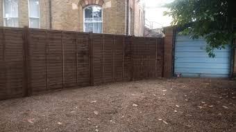 Lap larch panel fencing. album cover