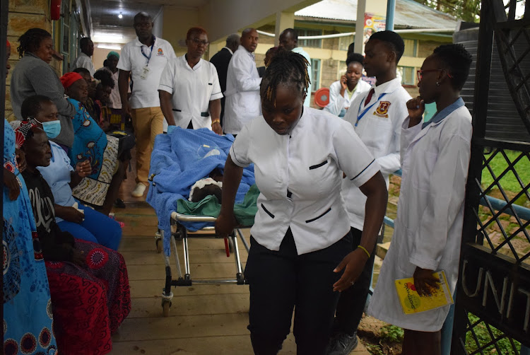 Medics are rushing the defiled and injured girl into a room for medication at Homa Bay Teaching and Referral Hospital on November 14,2023