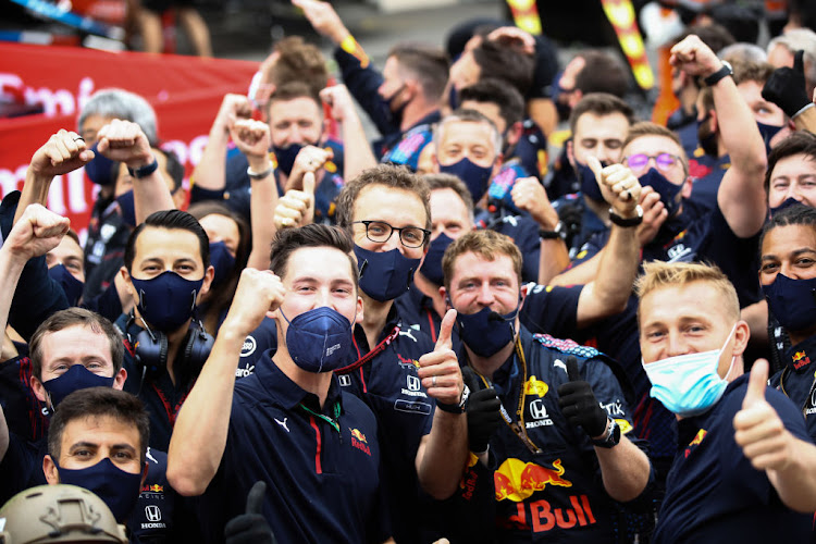 Red Bull Racing team members celebrate the victory of Max Verstappen of Netherlands and Red Bull Racing and third place of Sergio Perez of Mexico and Red Bull Racing in parc ferme during the F1 Grand Prix of France at Circuit Paul Ricard on June 20, 2021 in Le Castellet, France.