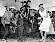 Miriam Makeba, right, played Joyce, Nathan Mdledle was  King Kong and James Thompson in the background  took the role of Slim in the original 1959 production of 'King Kong'.