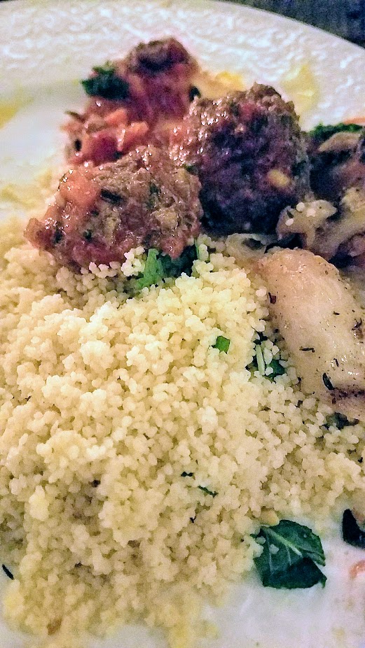 Breaking Breads Dinner Series Pop Up Shabbat, Main dishes of Siniya (Lamb Meatballs) and Chicken with Za'atar, served with couscous