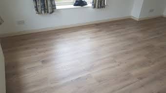 New installation of wood flooring to a 2 bedroom flat. album cover