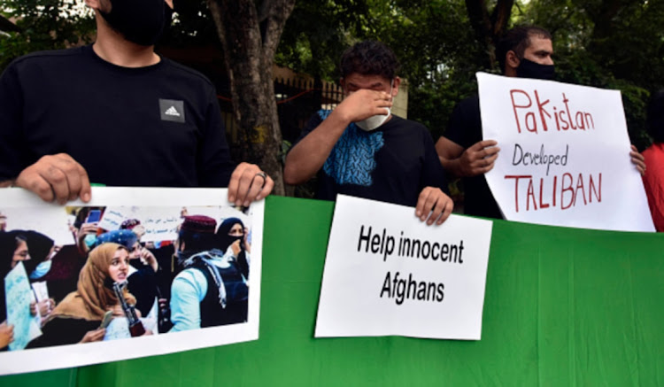 Afghan refugees protest against support for the Taliban in Afghanistan, September 14 2021. Picture: SANJEEV VERMA/HINDUSTAN TIMES/GETTY IMAGES