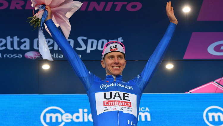 UAE Team Emirates' Tadej Pogacar celebrates on the podium wearing the maglia azzurra after winning stage 2. Picture: JENNIFER LORENZINI/REUTERS