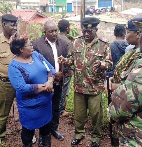 Limuru deputy county commissioner Charles Mukele (center) speaks with Nominated MCA Pacifica Ongecha at Limuru town.