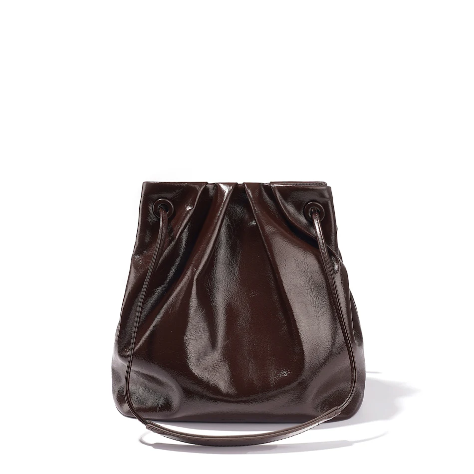 Nieuwe Dames Bucket Bag met Trekkoord, Schouder en Crossbody, Stijlvol en Functioneel voor Dagelijks Gebruik en Verschillende Gelegenheden.