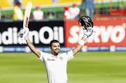 THE NEW MASTER: Virat Kholi of India celebrates his century during day one of the first Test against South Africa at Bidvest Wanderers Stadium in Johannesburg yesterday