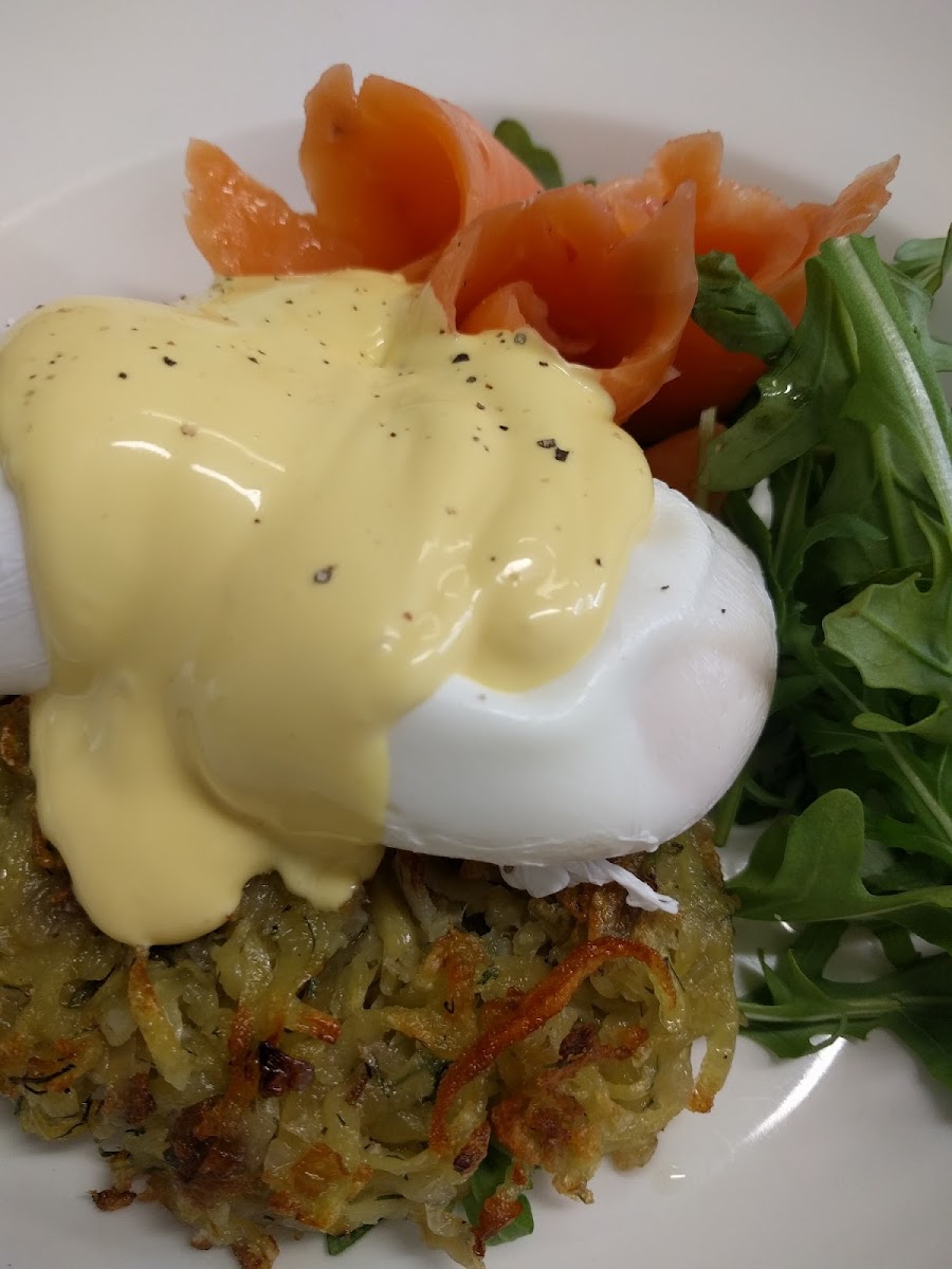 Homemade potato rosti with salmon, rocket and hollandaise