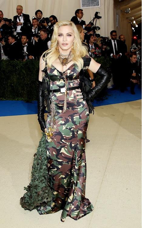 Madonna dressed by Moschino's Jeremy Scott.