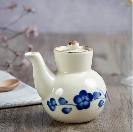Pot à épices créatif en céramique peint à la main pour restaurants. Apportez une touche unique et créative à votre cuisine avec ce pot élégant.