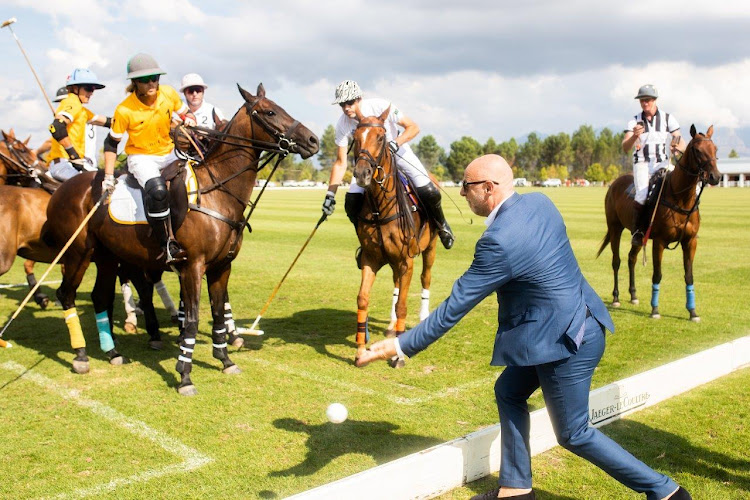 Pascal Asin Managing Director of Moët Hennessy for Africa and the Middle East throws in the ball to start the game