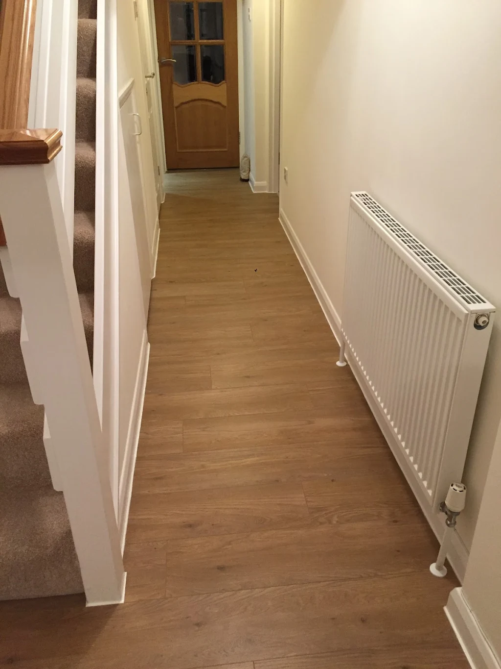Album cover: Laying laminate flooring.