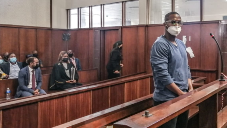 Mbuso Moloi pleaded guilty to looting a store in Durban in July 2021. His advocate Willie Lombard wants a fresh correctional supervision report. File photo.