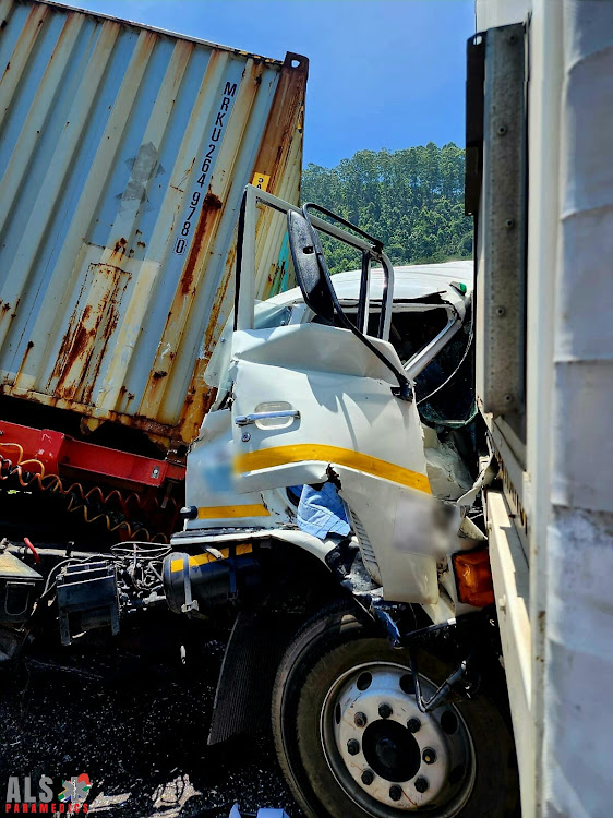 One truck driver is said to be trapped in his vehicle.