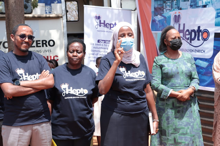 Hepto officials with Machakos Health executive Ruth Mutua during a free medical camp at Mukusu dispensary in Masinga, Machakos county on Wednesday, March 23.