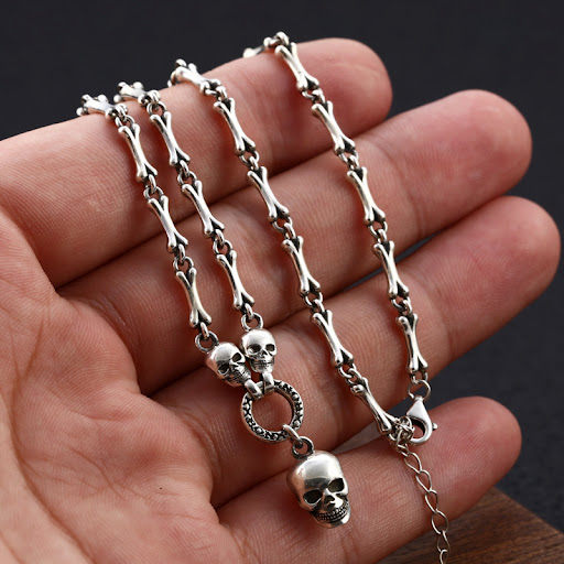 Title 4, Sterling Silver Male And Female Skull Bone Stit...