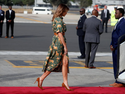 U.S. first lady Melania Trump boards an aircraft as she departs Nairobi, Kenya, October 6, 2018. REUTERS