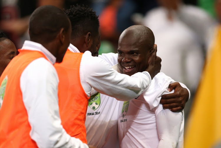 Goodman Dlamini of Free State Stars is congratulated for scoring the opening goal during the Nedbank Cup final match against Maritzburg United at Cape Town Stadium on May 19, 2018 in Cape Town, South Africa.