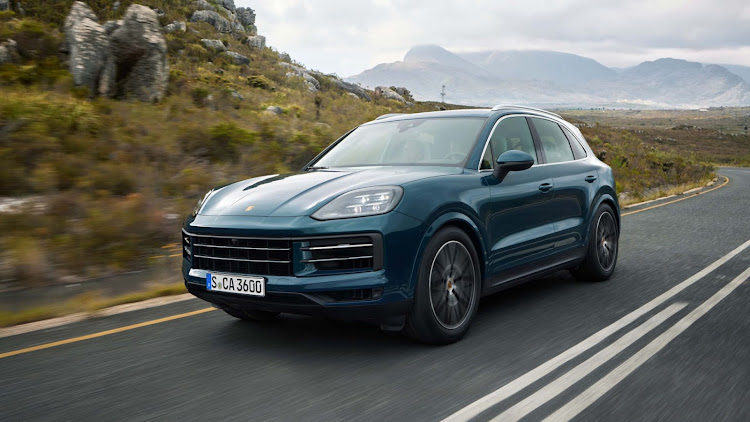 The facelifted Porsche Cayenne features a revised front end that borrows design cues from the 911 and Taycan.