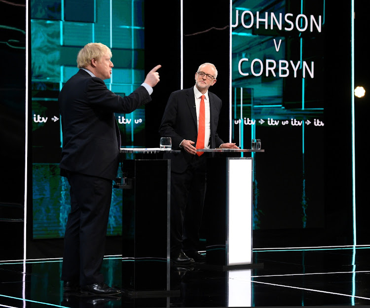 Conservative leader Boris Johnson, left, and Labour leader Jeremy Corbyn during a televised debate ahead of general election in London, Britain, on November 19 2019. Picture: ITV/HANDOUT VIA REUTERS/JONATHAN HORDLE