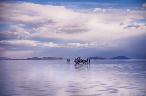 Adventure road trip at salt flat Salar de Uyuni, Bolivia