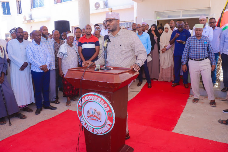 Wajir Governor Ahmed Abdullahi speaking outside the county offices on Saturday when he flagged off Ramadhan foodstuff to 25,000 households for Ramadhan.