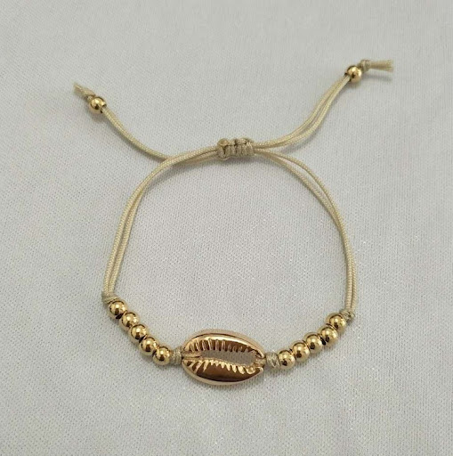 Title 6, Holiday Round Beads Woven Shell Bracelet, a bea...