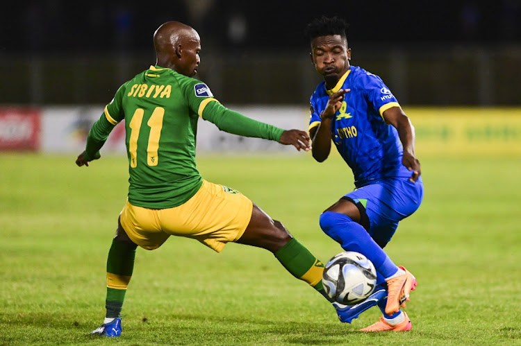 Lesiba Nku of Mamelodi Sundowns and Nduduzo Sibiya of Golden Arrows FC during the DStv Premiership match between Golden Arrows and Mamelodi Sundowns at Mpumalanga Stadium.