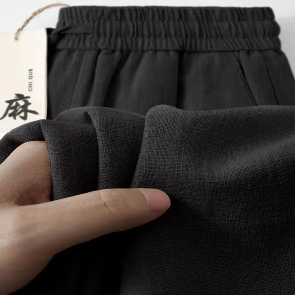 Pantalon décontracté droit ample en ramie pour homme, léger et respirant, idéal pour un confort optimal au quotidien et en été.