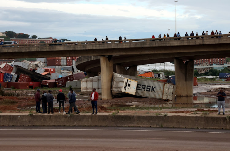 Containers were washed away by floods in April, closing the M4 into Durban. Damage from the floods contributed to SA's economy shrinking in the second quarter. File photo.