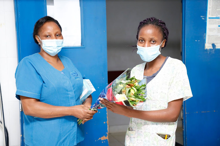 Neema Hospital nursing officer in-charge Rose Mwangi and colleague Margret Musume