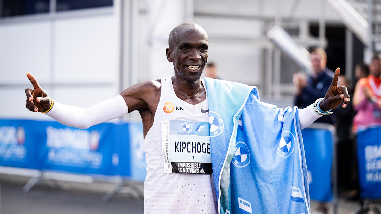 Eliud Kipchoge of Kenia celebrates his marathon world record of 2:01:09 during the 2022 BMW Berlin-Marathon on September 25 2022.