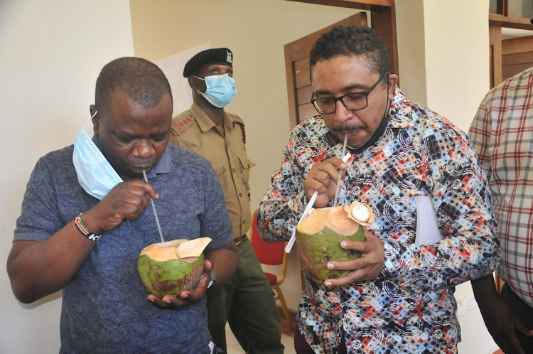 ICT PS Jerome Ochieng and Mombasa county ICT chief officer Anwar Ahmed after a tour of the Mama Ngina Waterfront Park.