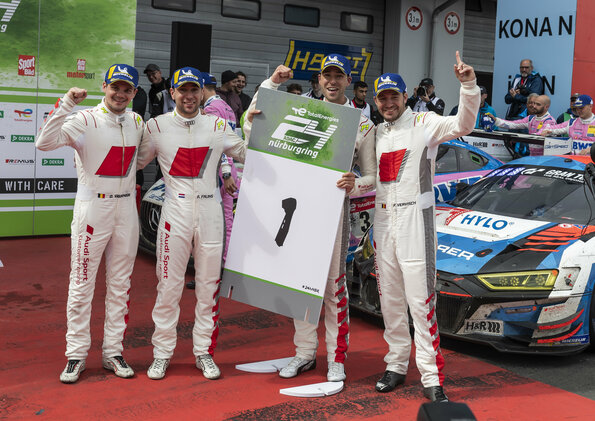 The Audi Sport Team Phoenix drivers celebrate winning the 2022 24 Hours of Nürburgring. From left: Dries Vanthoor, Robin Frijns, Kelvin van der Linde, Frédéric Vervisch.