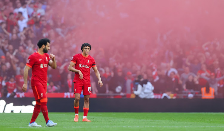 Mohamed Salah and Trent Alexander-Arnold of Liverpool during The FA Cup semifinal match against Manchester City at Wembley Stadium on April 16 2022.