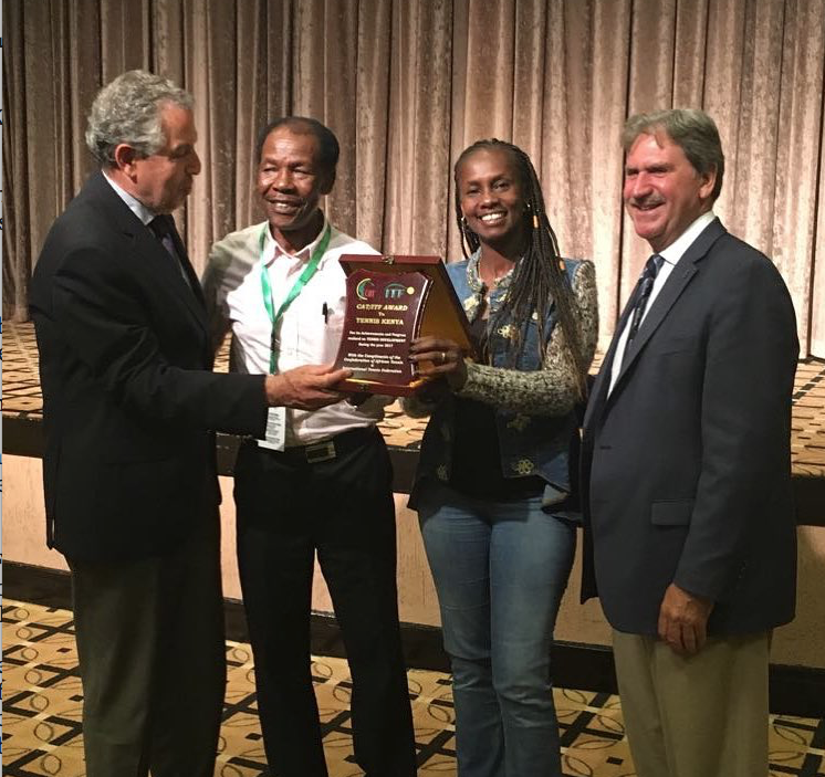 Tennis Kenya President, James Kenani (2nd L) and Wanjiru Karani (2nd R) receive ITF CAT Award from ITF President, David Haggerty (R) and CAT President, Tarak Cherif (L)