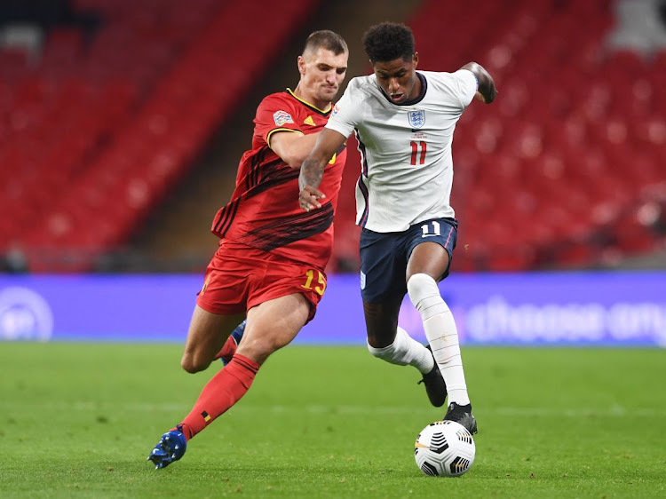 Belgium's Thomas Meunier in action with England's Marcus Rashford during the UEFA Nations League A, Group 2 fixture at Wembley Stadium, London on October 11, 2020