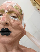 Steven Cohen's cellphone selfie of the process by which he creates his 'tape-faces'.