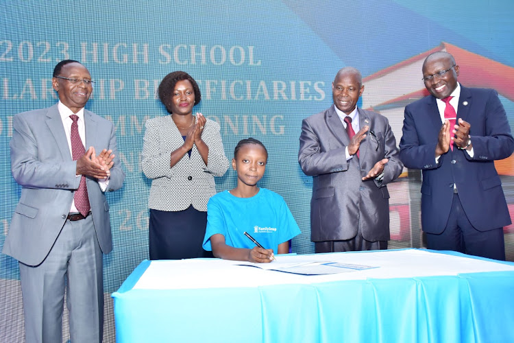 Family Bank Chair Wilfred Kiboro, CEO Rebecca Mbithi, Director of Education Chacha Mwita and Family Group Foundation Chairman Francis Muraya join Zoey Mutanu during the 2023 commissioning of the program for bright and needy students.