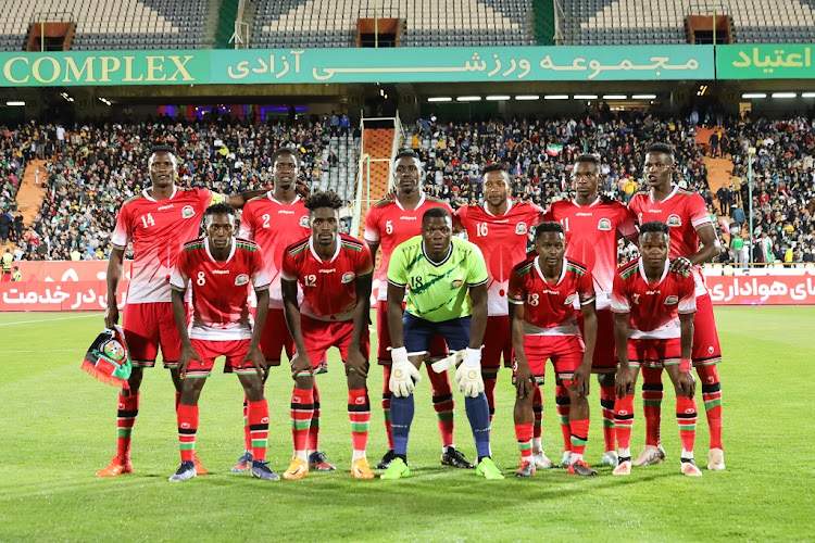 Harambee Stars players pose for a photo before a past action