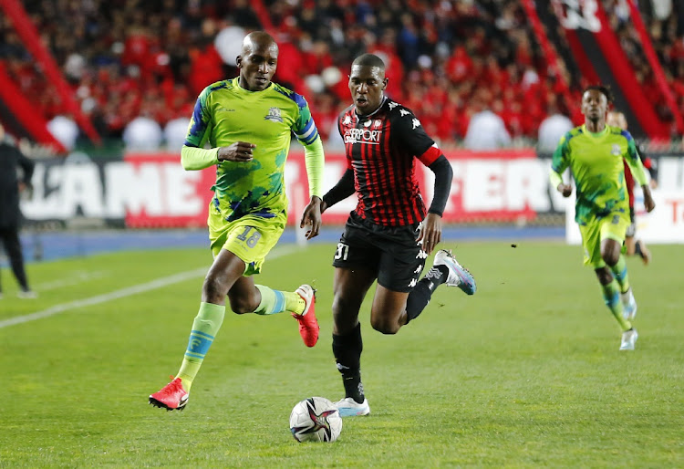 Lehlohonolo Nonyane of Gallants challenged by Tumisang Orebonye of USM Alger during the CAF Confederation Cup 2022/23 football match between USM Alger and Marumo Gallants at the Omar Hammadi Stadium in Algiers, Algiera.