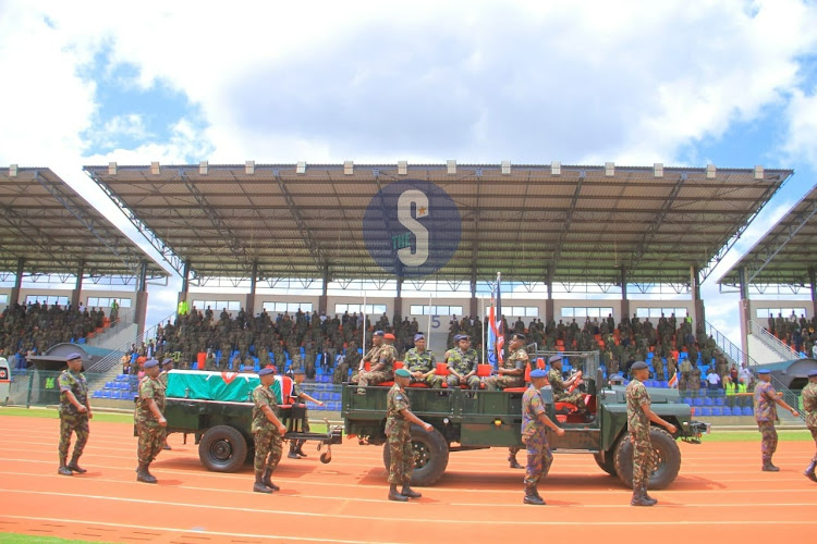 The body of the late CDF General Francis Ogolla is given the final salute by fellow KDF members at Ulinzi Sports Complex, Lang'ata, on April 20, 2024