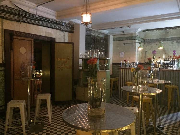 The vault inside Somerset House, originally built for the United Building Society (later Absa Bank), has been transformed into Zwipi Underground Bar.