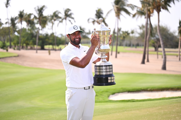 Tony Finau of the US poses with Mexico Open trophy during the award ceremony of the Mexico Open at Vidanta in Puerto Vallarta, Jalisco, April 30 2023. Picture: ORLANDO RAMIREZ/GETTY IMAGES