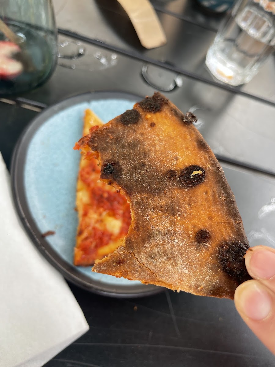 My VERY burnt “GF” (gluten-sensitive on their menu) pizza